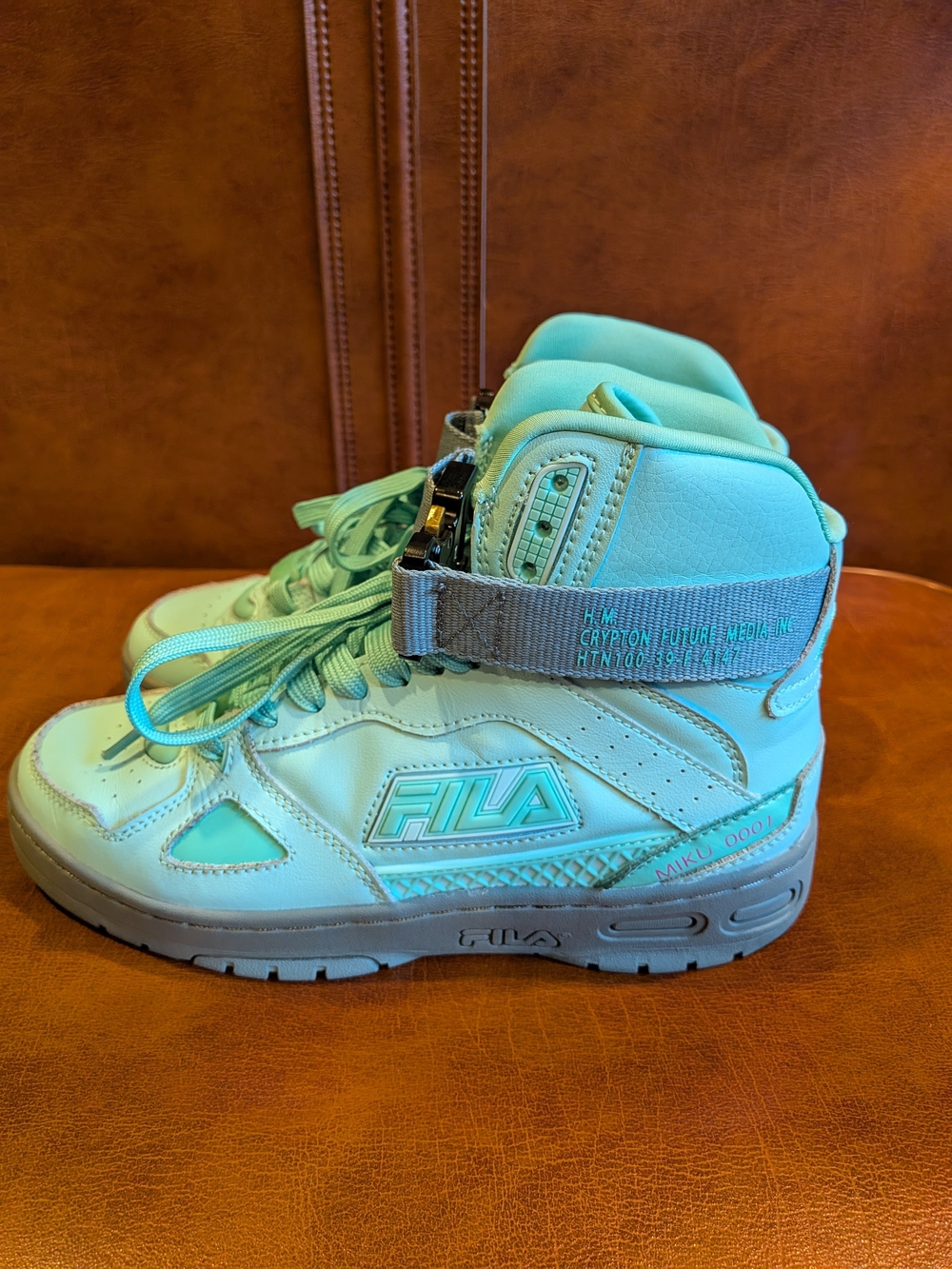 FILA  High-Top Sneakers in Teal - H.M. CRYPTON FUTURE MEDIA INC HTN100-39-F-4147